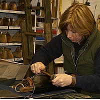 Rubbing down a back seam.