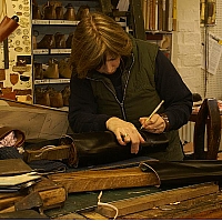 Hand work on boot uppers.